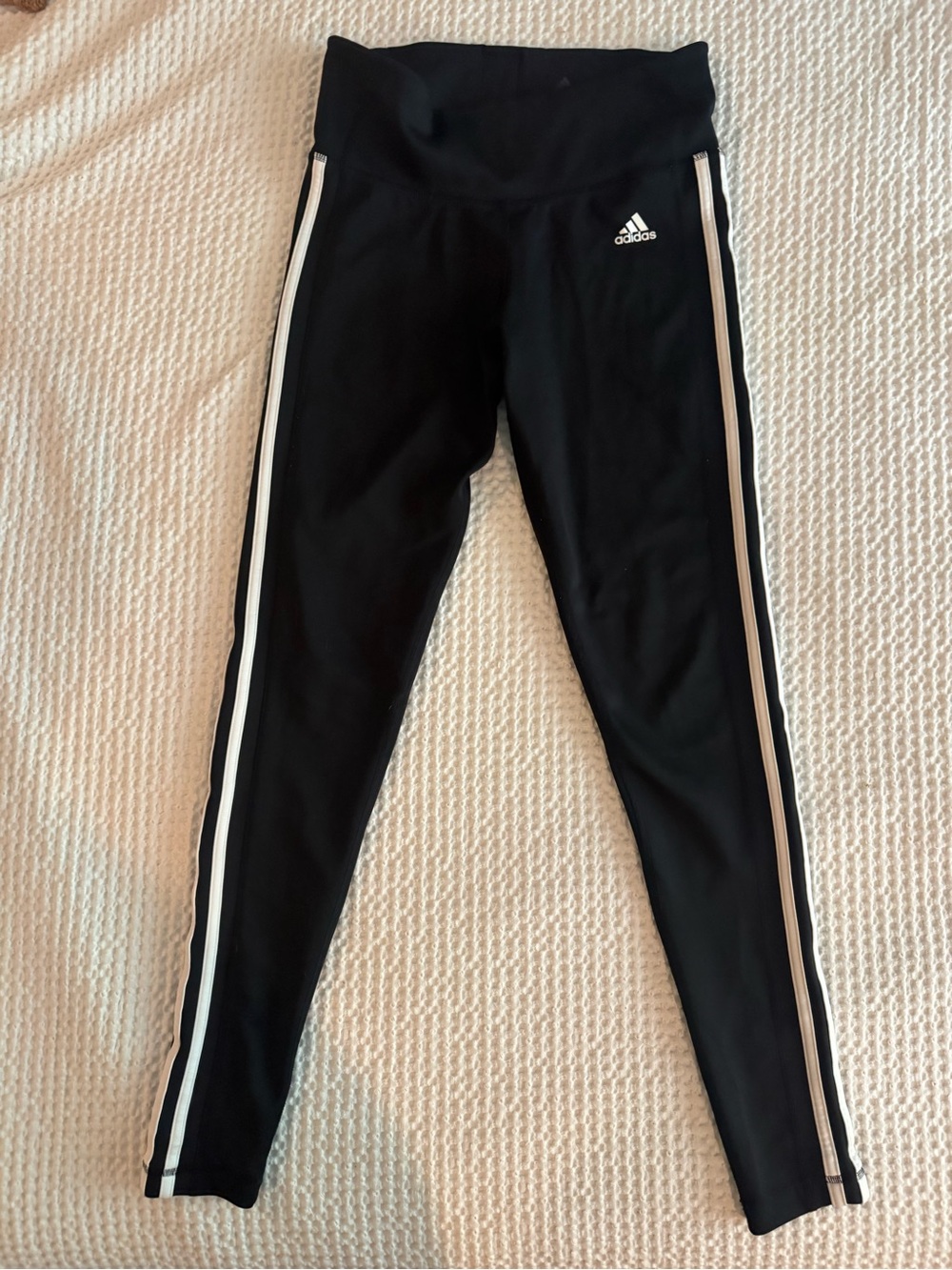 Adidas womenโs Black High-Waist Athletic Leggings with Side Stripes